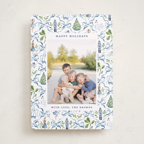 This is a blue ribbon holiday photo cards with standard by Sarah Knight called nutcracker ribbons printing on recycled smooth signature in standard