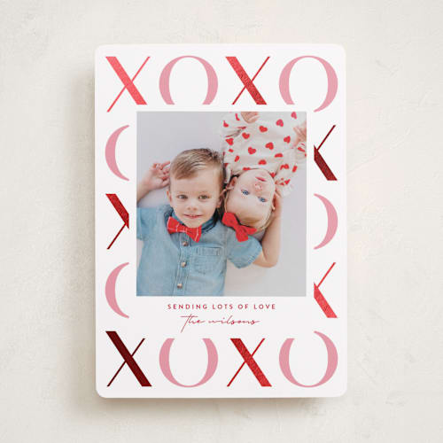 This is a bubblegum foil stamped valentine cards with foil pressed by Jessica Corliss called xo border printing on recycled smooth signature in standard