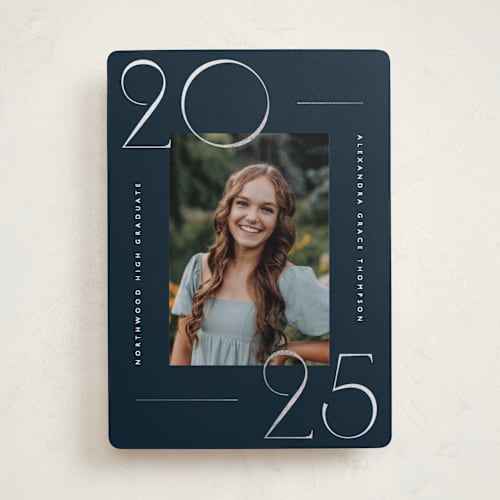 This is a navy graduation announcements with foil pressed by Kelly Schmidt called numbered printing on recycled smooth signature in standard