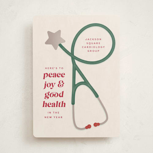 This is a kris kringle business holiday cards with standard by Kamala Nahas called merry stethoscope printing on signature in standard