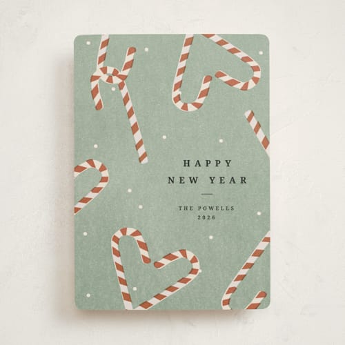 This is a sage non photo holiday cards with standard by Sumak Studio called sweet december printing on signature in standard