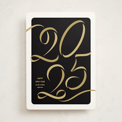 This is a trophy non photo holiday cards with standard by Lea Delaveris called ribbon year printing on signature in standard