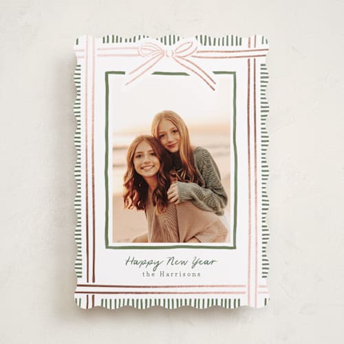 This is a pink sand foil pressed holiday cards with foil pressed by Chris Griffith called holiday wrap printing on recycled smooth signature in standard