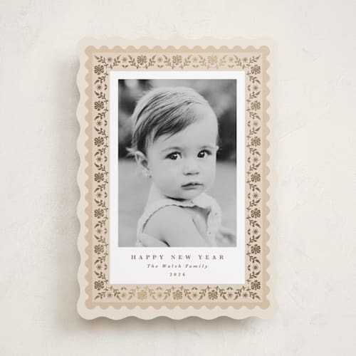 This is a eggnog foil pressed holiday cards with foil pressed by Olivia Raufman called folkloric printing on recycled smooth signature in standard