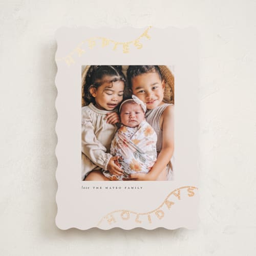 This is a ivory foil pressed holiday cards with foil pressed by Lori Wemple called string light printing on recycled smooth signature in standard