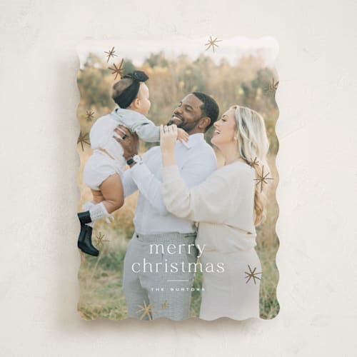 This is a snow foil pressed holiday cards with foil pressed by Wildfield Paper Co called twinkle! printing on recycled smooth signature in standard