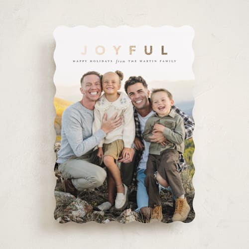 This is a coal foil pressed holiday cards with foil pressed by Laura Hamm called a joyful family printing on recycled smooth signature in standard