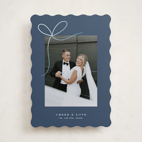 This is a blue spruce foil pressed holiday cards with foil pressed by Yuliya Evseeva called little bow printing on recycled smooth signature in standard