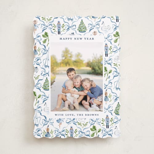 This is a blue ribbon holiday photo cards with standard by Sarah Knight called nutcracker ribbons printing on recycled smooth signature in standard