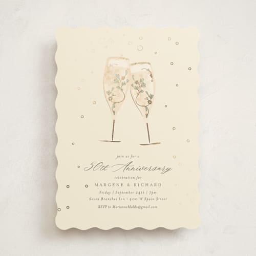 This is a ivory holiday party invitations with foil pressed by Kamala Nahas called champagne toast printing on signature in standard