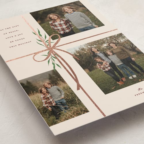 This is a burgundy foil stamped holiday cards with foil pressed by Susan Zinader called holiday gifts printing on signature in grand