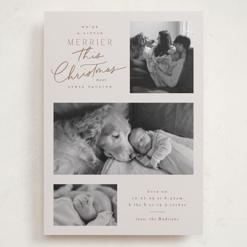 This is a toffee babys first christmas with standard by Everett Paper Goods called merrier this year printing on recycled smooth signature in grand