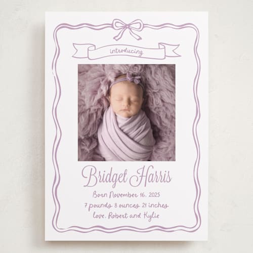 This is a lavander grand birth announcements with standard by Cass Loh called bow frame printing on recycled smooth signature in grand