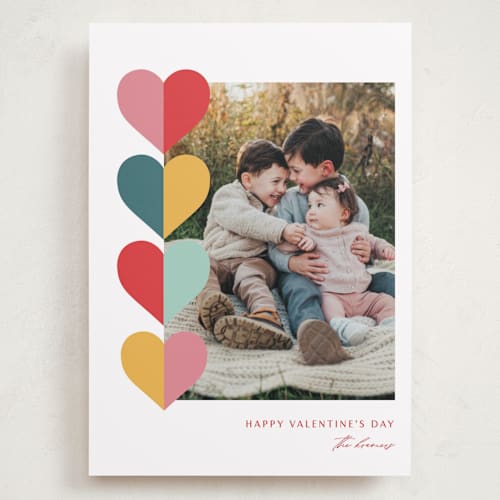 This is a confetti valentines day with standard by Leah Ragain called hearts trio printing on recycled smooth signature in grand