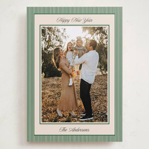 This is a pine holiday photo cards with standard by Annie Shapiro called little stripes printing on recycled smooth signature in grand