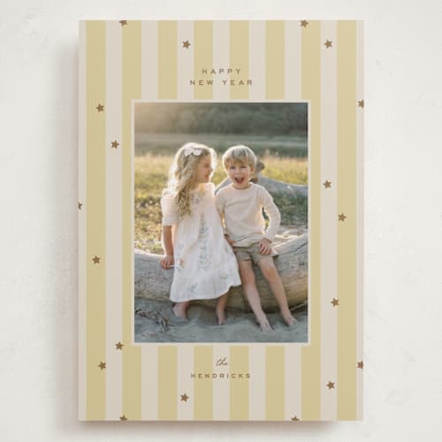 This is a butter holiday photo cards with standard by Ellen Schlegelmilch called stars & stripes printing on recycled smooth signature in grand