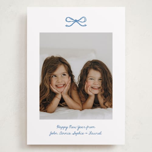 This is a blue spruce holiday photo cards with standard by Kelly Watkins called mini bow printing on recycled smooth signature in grand