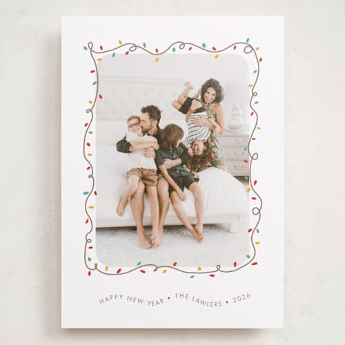 This is a frosting holiday photo cards with standard by Holly Whitcomb called crazy lights printing on recycled smooth signature in grand