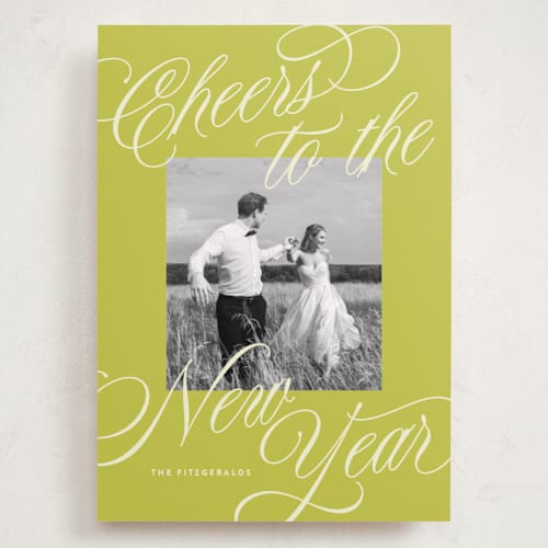 This is a lime holiday photo cards with standard by Jackie Crawford called all scripts printing on recycled smooth signature in grand