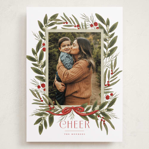 This is a poinsettia holiday photo cards with standard by Wildfield Paper Co called snowberry wreath printing on recycled smooth signature in grand