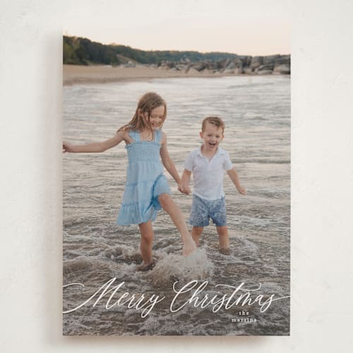 This is a snow holiday photo cards with standard by Kelly Schmidt called scripted merry christmas printing on recycled smooth signature in grand
