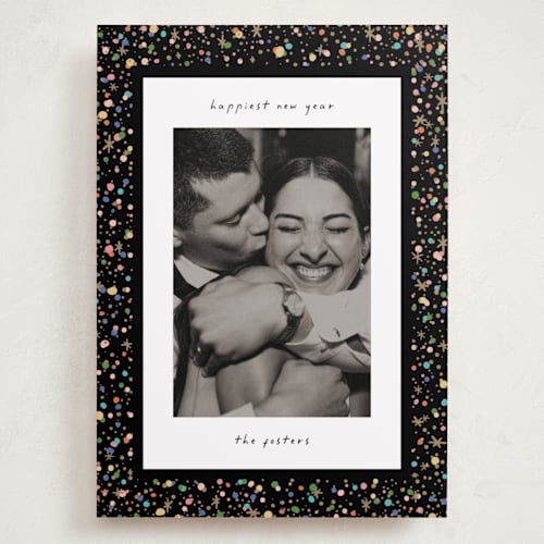 This is a popped holiday photo cards with standard by Pixel and Hank called confetti and sparkle printing on recycled smooth signature in grand
