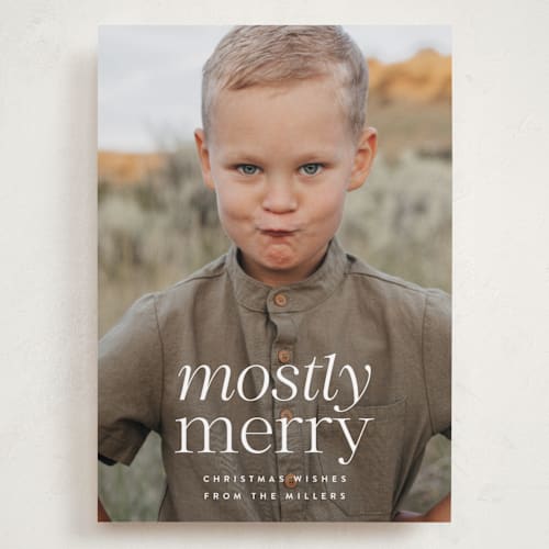 This is a vanilla holiday photo cards with standard by Ekko Studio called mostly merry printing on recycled smooth signature in grand