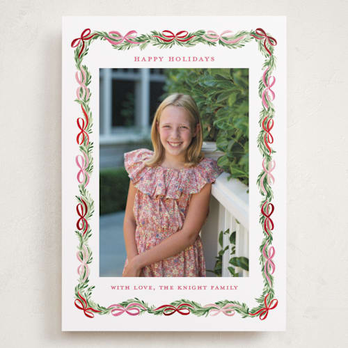 This is a candy cane holiday photo cards with standard by Sarah Knight called boughs of bows printing on recycled smooth signature in grand
