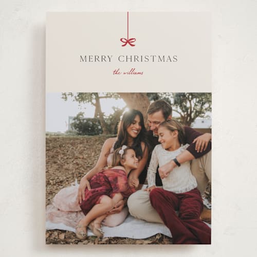 This is a poinsettia holiday photo cards with standard by Pixel and Hank called bow printing on recycled smooth signature in grand