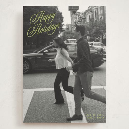 This is a mistletoe glow holiday photo cards with standard by JoAnn Jinks called neon vintage printing on recycled smooth signature in grand