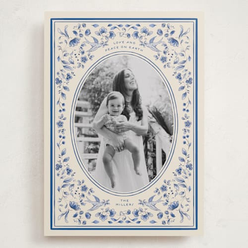 This is a porcelain holiday photo cards with standard by Sabrin Deirani called peaceful blooms in blue printing on recycled smooth signature in grand
