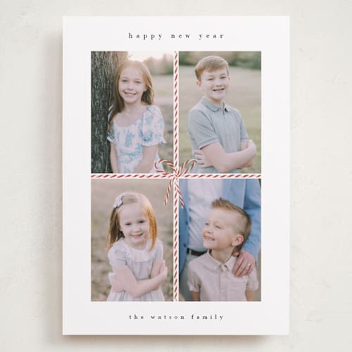 This is a candy cane holiday photo cards with standard by Dani Lugato called candy caner ribbon printing on recycled smooth signature in grand