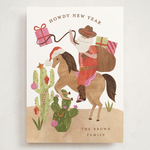 This is a candy cane holiday photo cards with standard by Sarah Knight called howdy holidays y'all printing on signature in grand