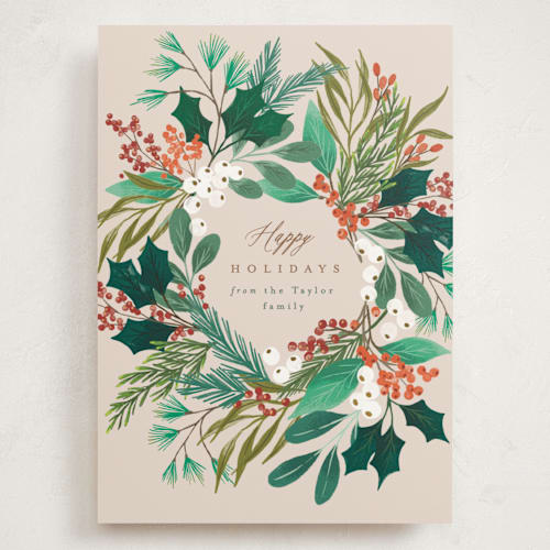 This is a buttercream holiday photo cards with standard by Alethea and Ruth called foliage wreath printing on signature in grand
