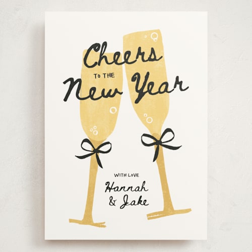 This is a champagne holiday photo cards with standard by Kamala Nahas called cheers printing on signature in grand