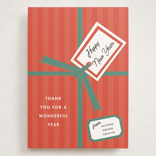 This is a secret santa holiday photo cards with standard by Ani Somi called gift wrap printing on signature in grand