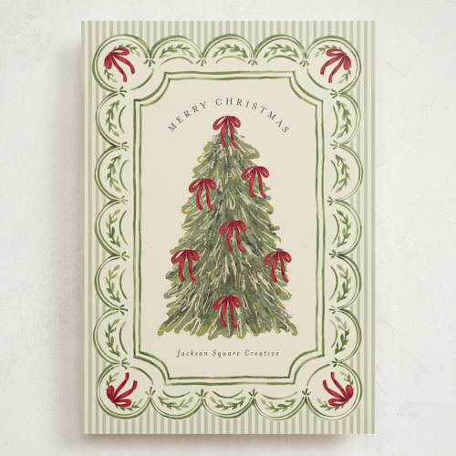 This is a evergreen holiday photo cards with standard by Chris Griffith called holiday bow tree printing on signature in grand