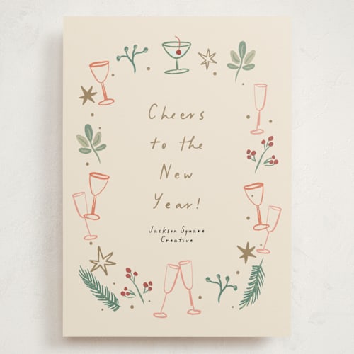 This is a champagne holiday photo cards with standard by Ani Somi called a very merry holiday cheers printing on signature in grand