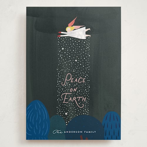 This is a forest holiday photo cards with standard by Eve Schultz called snow angel printing on signature in grand