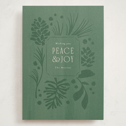 This is a wintergreen holiday photo cards with standard by Jennifer Wick called pines and pinecones printing on signature in grand