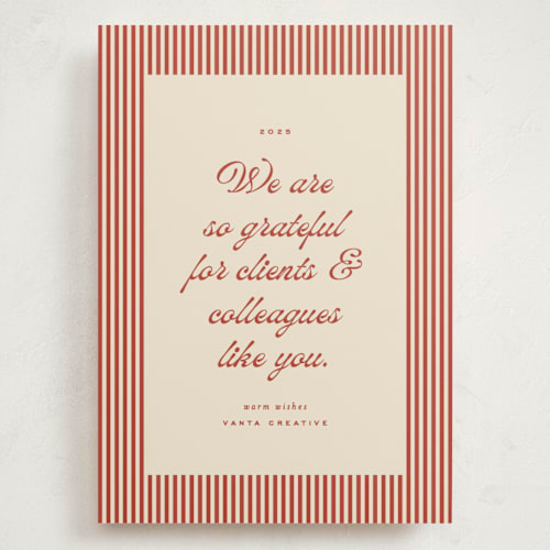 This is a cranberry holiday photo cards with standard by Ellen Schlegelmilch called pinstriped border printing on signature in grand