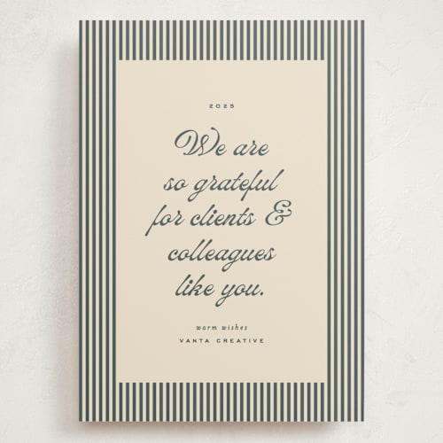 This is a navy holiday photo cards with standard by Ellen Schlegelmilch called pinstriped border printing on signature in grand