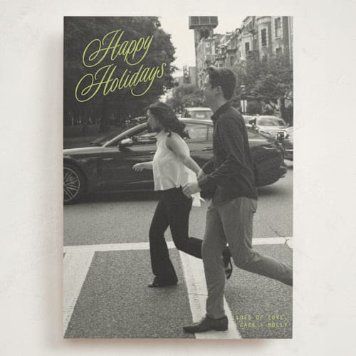 This is a mistletoe glow holiday photo cards with standard by JoAnn Jinks called neon vintage printing on signature in grand