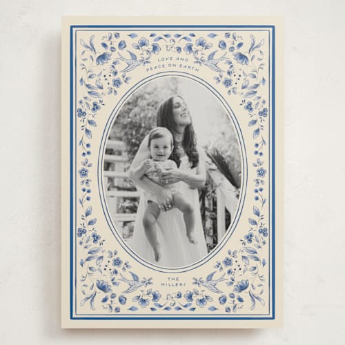 This is a porcelain holiday photo cards with standard by Sabrin Deirani called peaceful blooms in blue printing on signature in grand