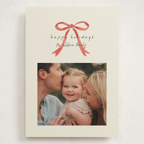 This is a peppermint holiday photo cards with standard by Laura Hankins called painted bow printing on signature in grand