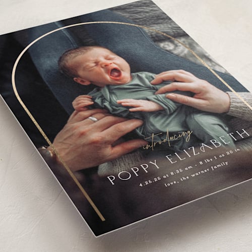 This is a linen foil stamped birth announcements with foil pressed by Erica Krystek called classic arch printing on recycled smooth signature in petite