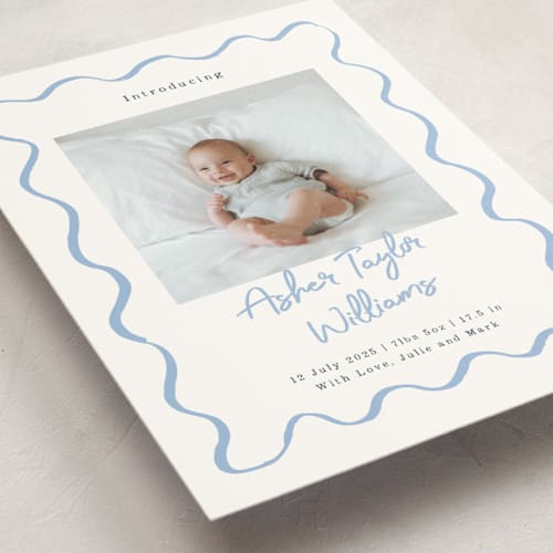 This is a dusty blue petite birth announcements with standard by Cass Loh called handdrawn wavy frame printing on signature in petite