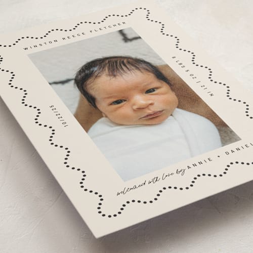 This is a licorice petite birth announcements with standard by Kelly Watkins called squiggle printing on signature in petite