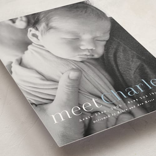This is a sky blue birth announcement postcards with standard by Hooray Creative called meet charley printing on signature in postcard
