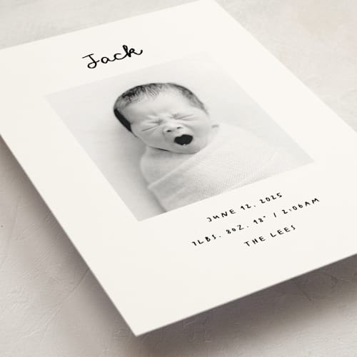 This is a snow birth announcement postcards with standard by AK Graphics called cursive printing on signature in postcard